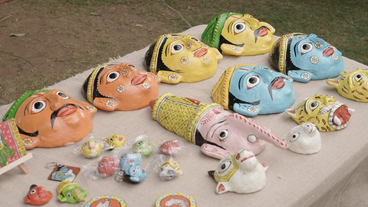 Hand-painted Cheriyal masks and dolls